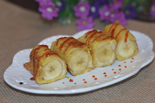 <a href=/shicai/guopin/XianJiao/index.html target=_blank><u>香蕉</u></a><a href=/shicai/mimian/TuSi/index.html target=_blank><u>吐司</u></a>卷