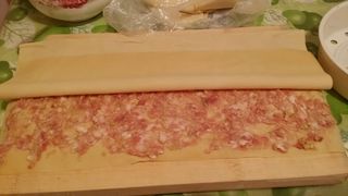 家庭版<a href=/shicai/mimian/DouPi/index.html target=_blank><u>豆皮</u></a>肉卷