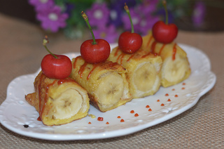 <a href=/shicai/guopin/XianJiao/index.html target=_blank><u>香蕉</u></a><a href=/shicai/mimian/TuSi/index.html target=_blank><u>吐司</u></a>卷